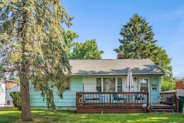 910 Pauline Ave, Columbus, OH 43224 - view of front of property with a chimney, a front yard, a shingled roof, and crawl space