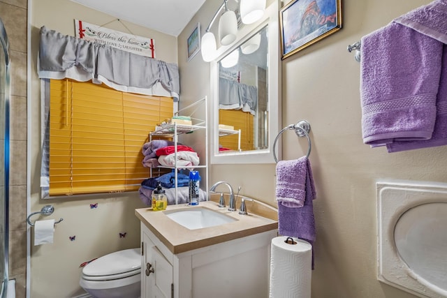 910 Pauline Ave, Columbus, OH 43224 - bathroom featuring toilet and vanity