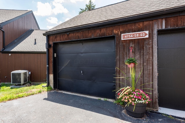 4758 Crazy Horse Ln Unit 2, Westerville, OH 43081 - garage featuring asphalt driveway