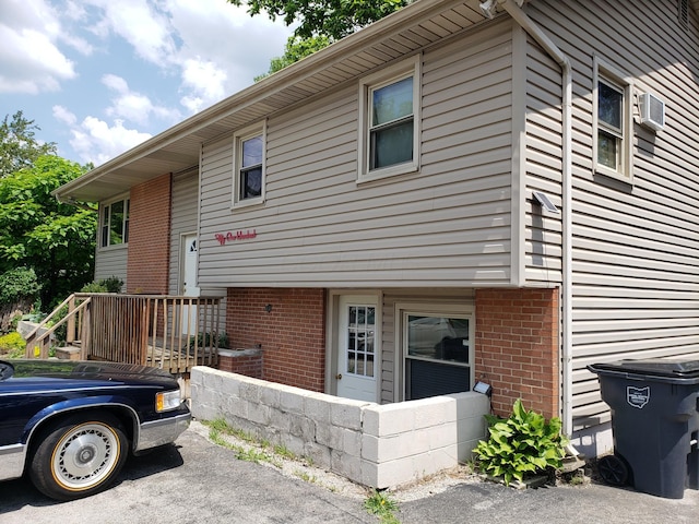 5100 Cleveland Ave, Columbus, OH 43231 - raised ranch featuring brick siding and a wall unit AC