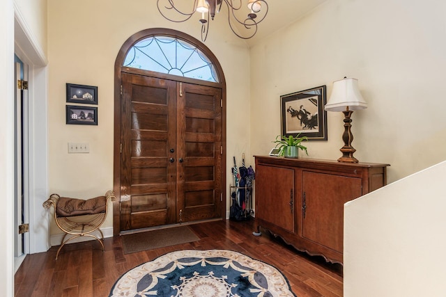 161 Jackson St, Columbus, OH 43206 - foyer entrance with a chandelier and dark wood-style floors