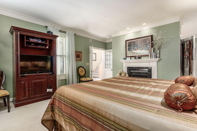 161 Jackson St, Columbus, OH 43206 - bedroom with light carpet, a premium fireplace, crown molding, and recessed lighting