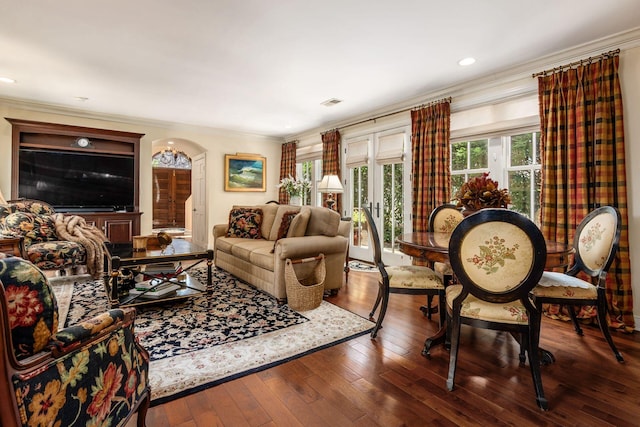 161 Jackson St, Columbus, OH 43206 - living room with arched walkways, crown molding, hardwood / wood-style floors, and recessed lighting