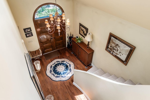 161 Jackson St, Columbus, OH 43206 - foyer featuring wood finished floors and a chandelier