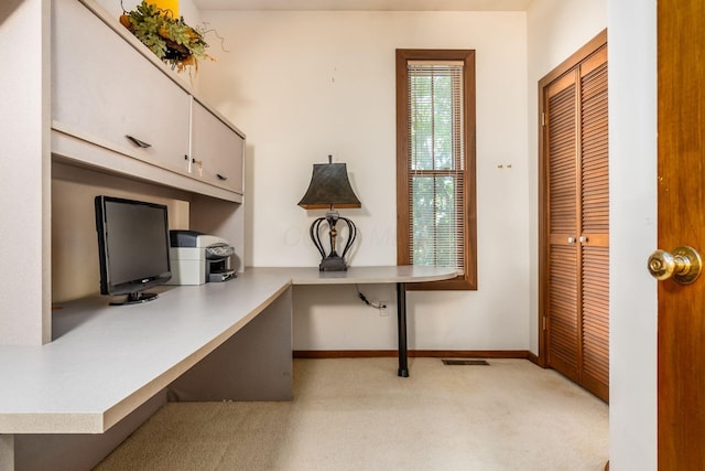 161 Jackson St, Columbus, OH 43206 - office area featuring light carpet and built in desk