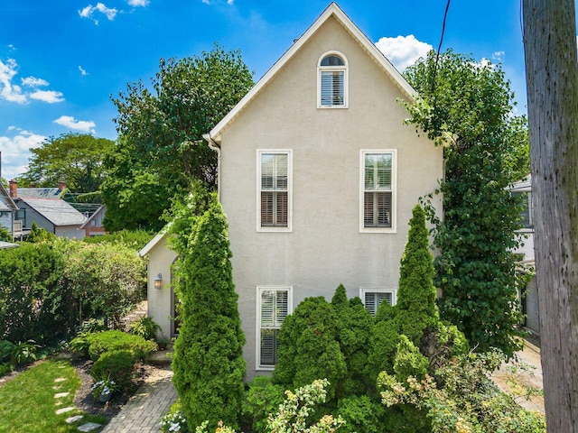 161 Jackson St, Columbus, OH 43206 - view of home's exterior with stucco siding