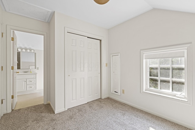 130 Boving Rd, Lancaster, OH 43130 - unfurnished bedroom featuring carpet, a closet, and vaulted ceiling