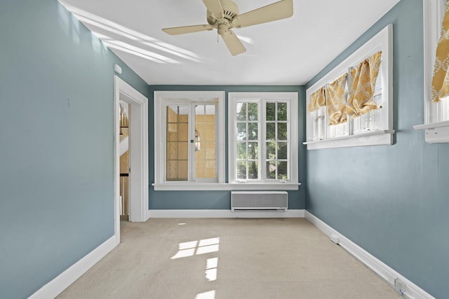 130 Boving Rd, Lancaster, OH 43130 - spare room featuring carpet flooring, ceiling fan, and a wall mounted air conditioner