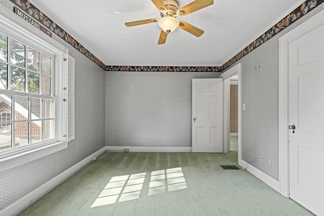 130 Boving Rd, Lancaster, OH 43130 - carpeted empty room with wallpapered walls and a ceiling fan