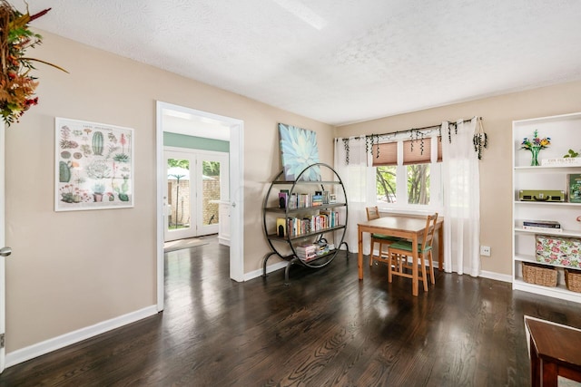 2328 Terrance Dr Unit 76, Columbus, OH 43220 - dining space featuring wood finished floors, healthy amount of natural light, french doors, and a textured ceiling