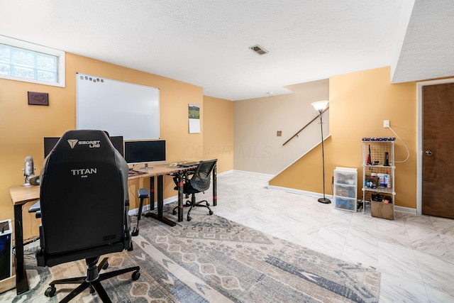 2328 Terrance Dr Unit 76, Columbus, OH 43220 - office area featuring marble finish flooring and a textured ceiling