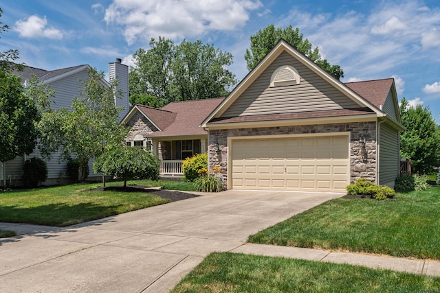 8090 Tree Lake Blvd, Powell, OH 43065 - view of front facade featuring stone siding, an attached garage, driveway, a front lawn, and a chimney