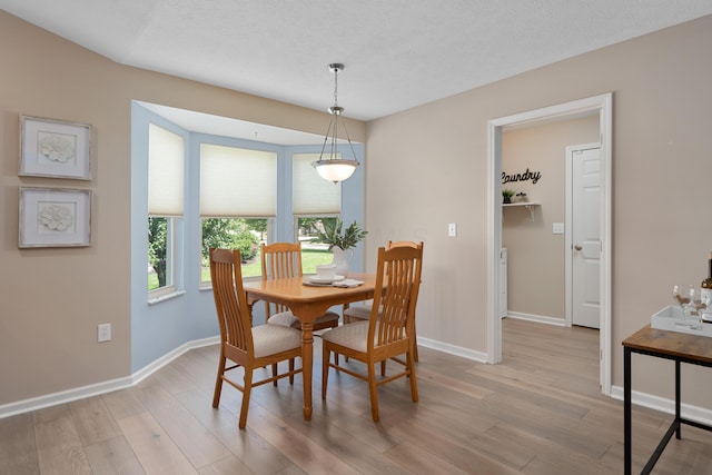 8090 Tree Lake Blvd, Powell, OH 43065 - dining area with light wood-type flooring