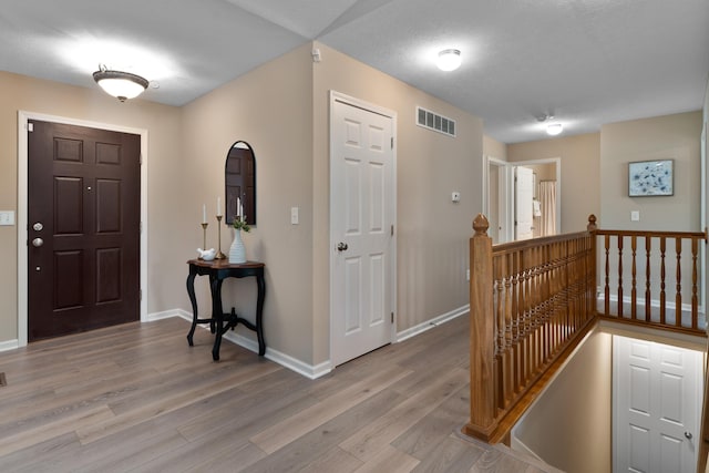 8090 Tree Lake Blvd, Powell, OH 43065 - entrance foyer featuring light wood-style flooring and baseboards