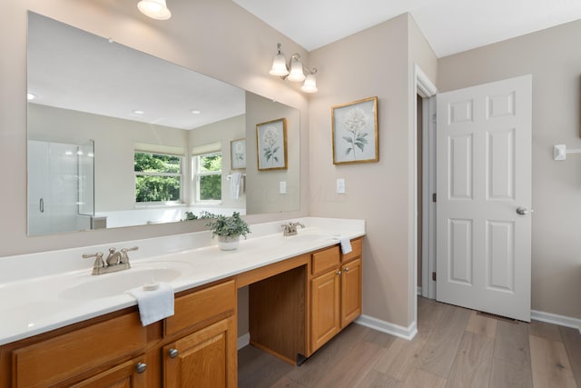 8090 Tree Lake Blvd, Powell, OH 43065 - full bath with double vanity, wood finished floors, and a stall shower