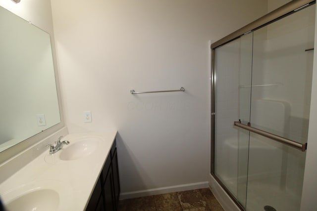3348 Glasgow Dr, Groveport, OH 43125 - bathroom with double vanity and a shower with shower door