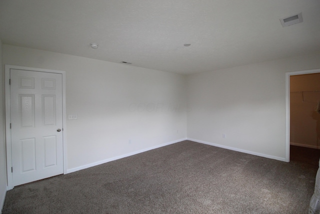 3348 Glasgow Dr, Groveport, OH 43125 - unfurnished room with dark carpet and baseboards