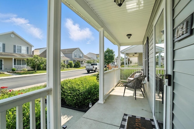 4764 Mattox St Unit 44, Columbus, OH 43228 - covered porch featuring a residential view