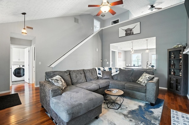 4764 Mattox St Unit 44, Columbus, OH 43228 - living room with washer / dryer, a ceiling fan, plenty of natural light, hardwood / wood-style floors, and high vaulted ceiling