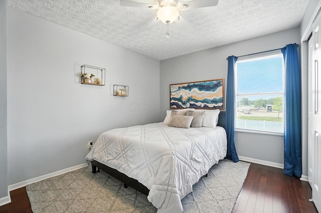 4764 Mattox St Unit 44, Columbus, OH 43228 - bedroom with hardwood / wood-style flooring, a ceiling fan, and a textured ceiling