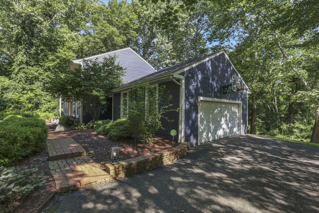 10 Denbigh Dr, Granville, OH 43023 - view of home's exterior with driveway and an attached garage