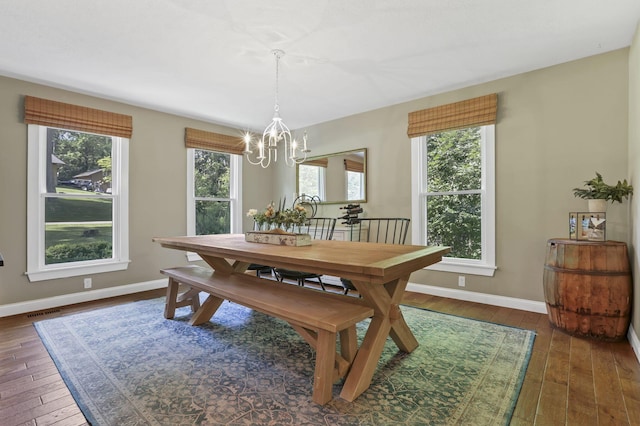 10 Denbigh Dr, Granville, OH 43023 - dining area with a chandelier and hardwood / wood-style flooring