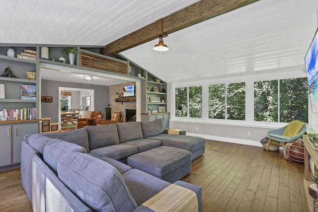 10 Denbigh Dr, Granville, OH 43023 - living room featuring hardwood / wood-style flooring, healthy amount of natural light, and built in shelves