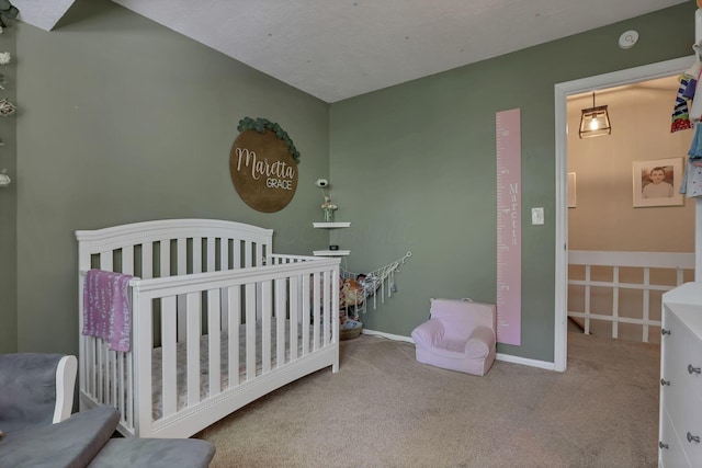 10 Denbigh Dr, Granville, OH 43023 - bedroom featuring carpet floors and a crib