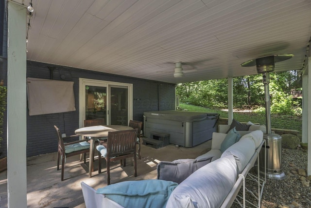 10 Denbigh Dr, Granville, OH 43023 - view of patio / terrace featuring a hot tub, outdoor dining space, and outdoor lounge area