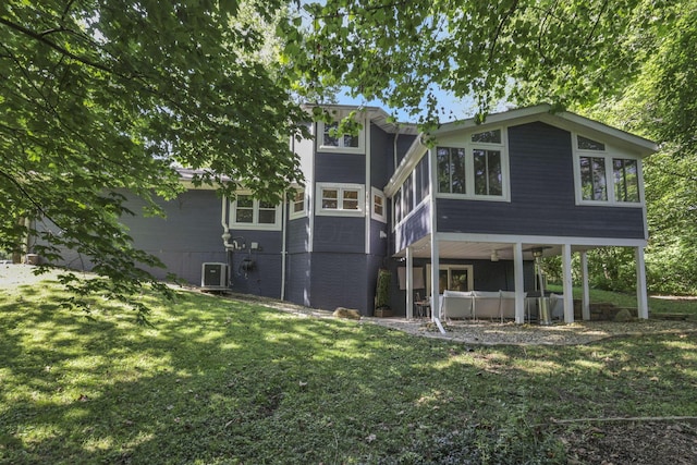 10 Denbigh Dr, Granville, OH 43023 - back of property featuring a jacuzzi and a yard