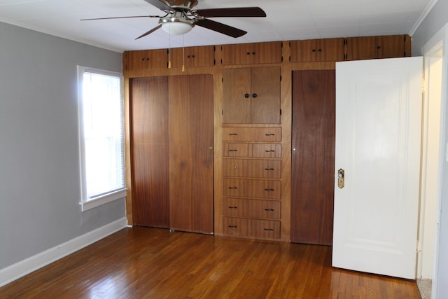 193 E Walnut St, Marion, OH 43302 - unfurnished bedroom featuring wood finished floors, ornamental molding, and a closet