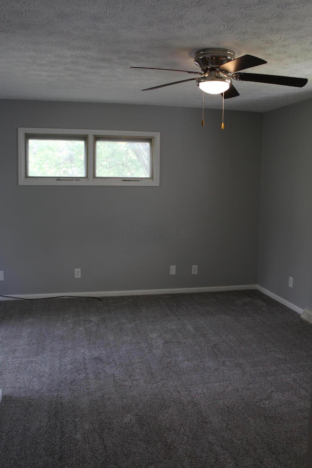 193 E Walnut St, Marion, OH 43302 - spare room featuring ceiling fan, plenty of natural light, a textured ceiling, and carpet
