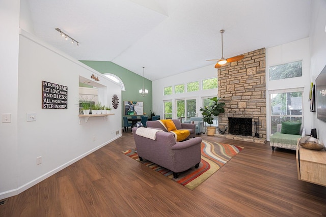 4247 Boulder Creek Dr, Columbus, OH 43230 - living area with wood finished floors, a ceiling fan, a fireplace, a chandelier, and high vaulted ceiling