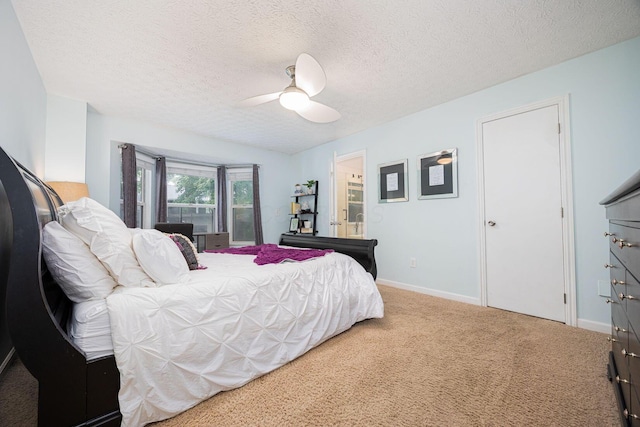 4247 Boulder Creek Dr, Columbus, OH 43230 - bedroom with carpet flooring, a textured ceiling, and a ceiling fan