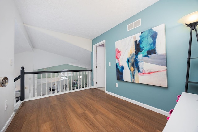 4247 Boulder Creek Dr, Columbus, OH 43230 - unfurnished room with wood finished floors and lofted ceiling