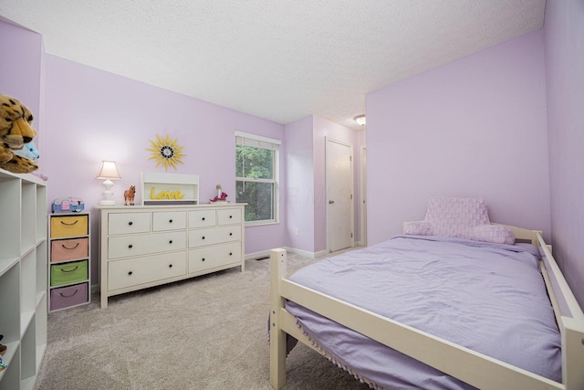 4247 Boulder Creek Dr, Columbus, OH 43230 - bedroom with carpet flooring and a textured ceiling