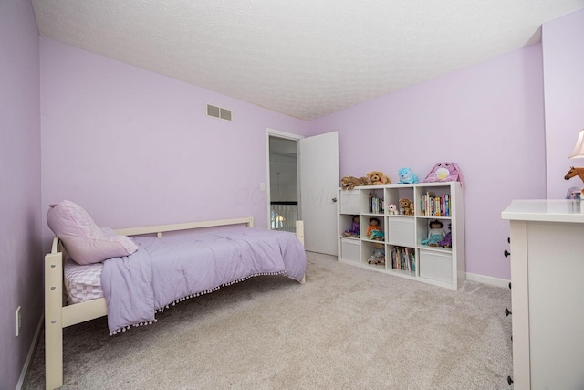 4247 Boulder Creek Dr, Columbus, OH 43230 - bedroom featuring carpet flooring and a textured ceiling
