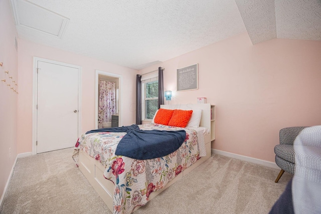 4247 Boulder Creek Dr, Columbus, OH 43230 - bedroom with carpet, a textured ceiling, attic access, and vaulted ceiling