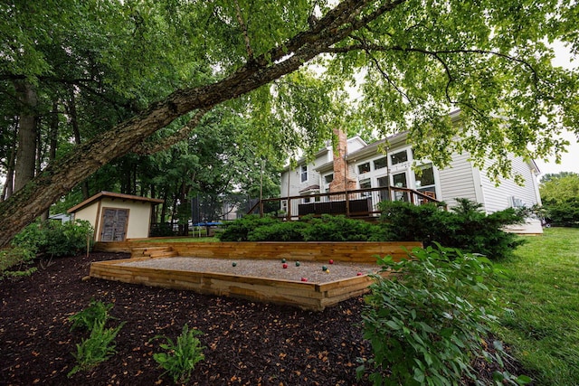 4247 Boulder Creek Dr, Columbus, OH 43230 - view of yard featuring an outbuilding and a wooden deck
