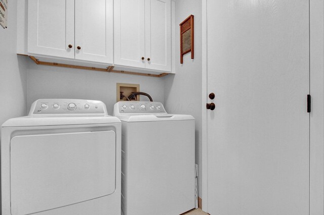 3007 Galen Ct, Hilliard, OH 43026 - laundry area with cabinet space and washing machine and dryer