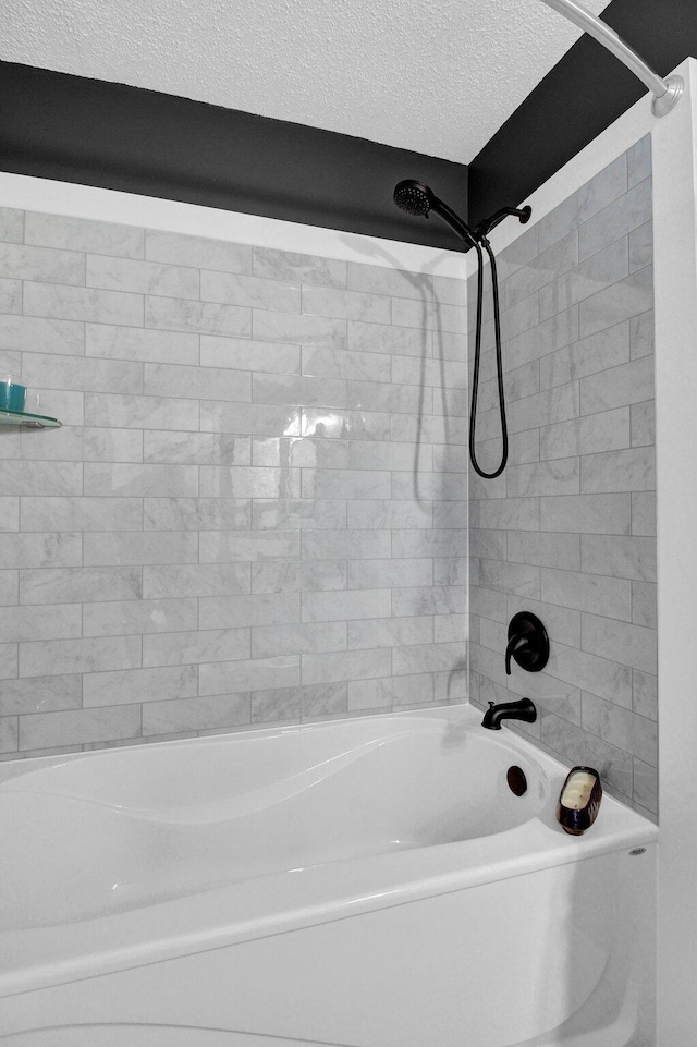 3007 Galen Ct, Hilliard, OH 43026 - bathroom with shower / washtub combination and a textured ceiling