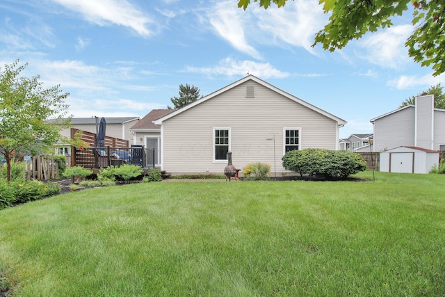 3007 Galen Ct, Hilliard, OH 43026 - back of house featuring a shed, a deck, and a lawn
