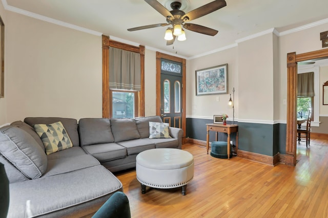 604 Elm St, Groveport, OH 43125 - living room featuring light wood finished floors, a ceiling fan, and crown molding