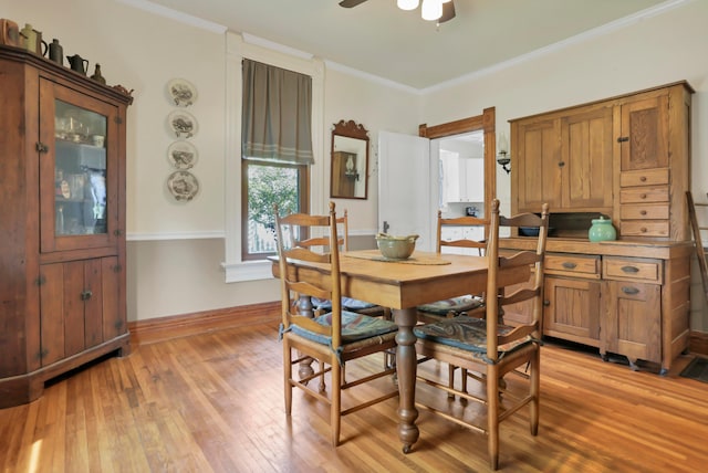 604 Elm St, Groveport, OH 43125 - dining space featuring ceiling fan, light wood-style flooring, and crown molding