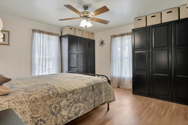 604 Elm St, Groveport, OH 43125 - bedroom with light wood finished floors and ceiling fan