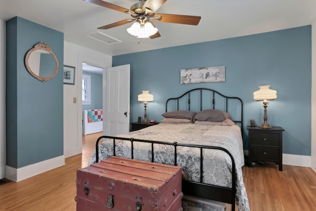 604 Elm St, Groveport, OH 43125 - bedroom with attic access, wood finished floors, and ceiling fan