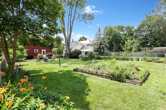 604 Elm St, Groveport, OH 43125 - view of yard featuring a vegetable garden