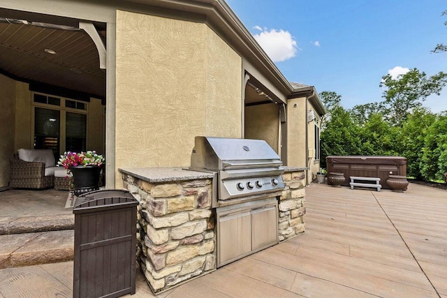 3150 Middle Pike, West Jefferson, OH 43162 - view of patio with a hot tub and an outdoor kitchen