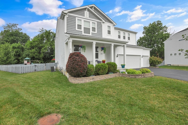 2267 Holiday Valley Dr, Grove City, OH 43123 - view of front of home with driveway, a porch, and a garage