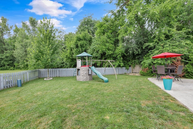 2267 Holiday Valley Dr, Grove City, OH 43123 - fenced backyard with a playground and a patio